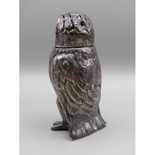 1535 - A mid Victorian silver owl pepper pot with glass eyes, makers mark for Daniel & Charles Hurle, Londo... 