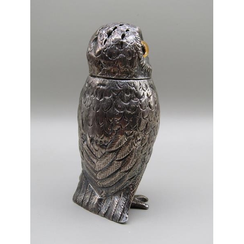 1535 - A mid Victorian silver owl pepper pot with glass eyes, makers mark for Daniel & Charles Hurle, Londo... 