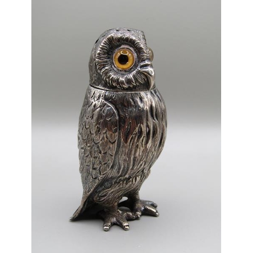 1535 - A mid Victorian silver owl pepper pot with glass eyes, makers mark for Daniel & Charles Hurle, Londo... 