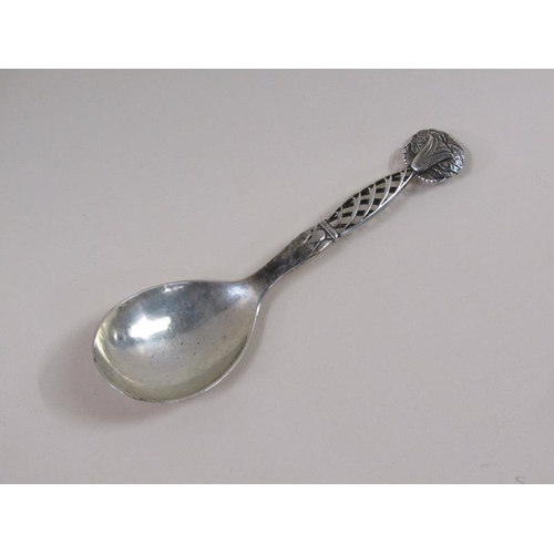 1733 - An early 20c Georg Jensen silver spoon with decorative handle and terminal, c.1925, 2.3ozt, 18.5cm l... 