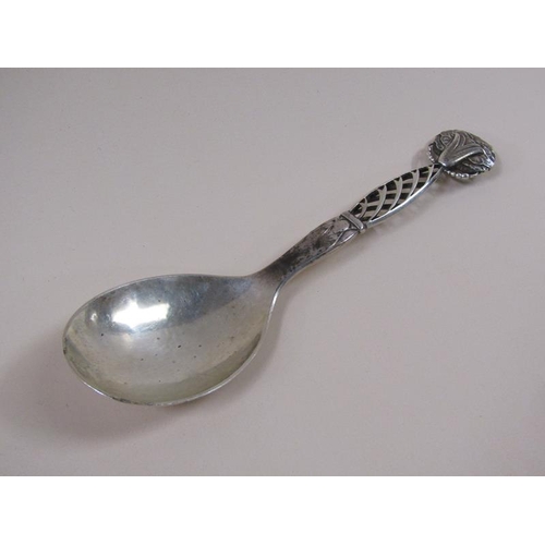 1733 - An early 20c Georg Jensen silver spoon with decorative handle and terminal, c.1925, 2.3ozt, 18.5cm l... 