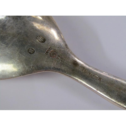 1733 - An early 20c Georg Jensen silver spoon with decorative handle and terminal, c.1925, 2.3ozt, 18.5cm l... 