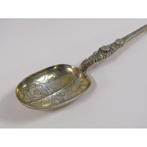 1734 - An Edwardian silver gilt anointing spoon, London 1904, 3ozt, 25.5cm l.