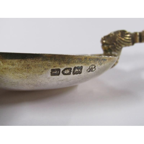 1734 - An Edwardian silver gilt anointing spoon, London 1904, 3ozt, 25.5cm l.