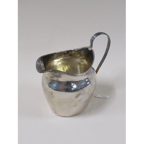 1744 - A George III silver cream jug, London 1799, 2.6ozt, 10cm h.