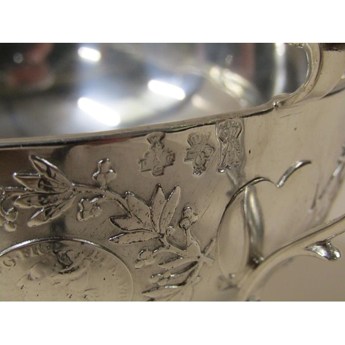 1756 - A Continental silver two handled bowl on stand with coin border decoration, heart terminals to the h... 