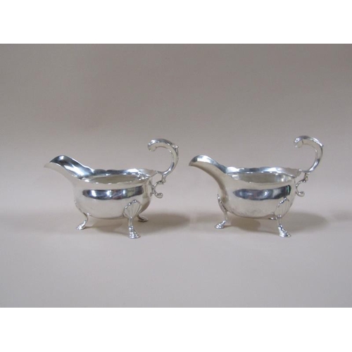 1764 - A pair of George II sauce boats, c.1745, 14.6ozt, each 16.5cm w.