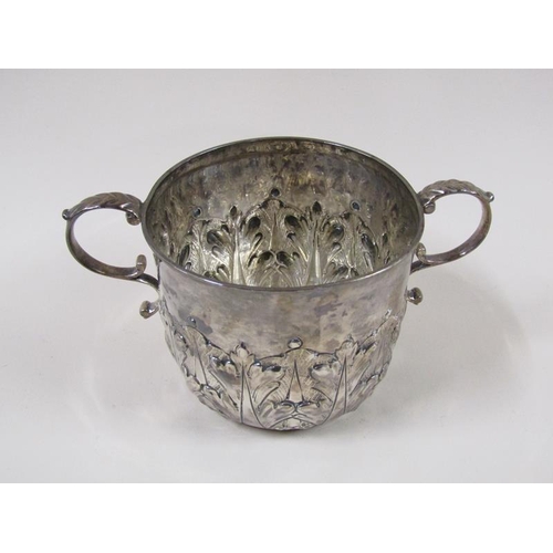 1765 - A late Victorian two handled loving cup, half leaf embossed, London 1890, 8.7ozt, 18cm w.