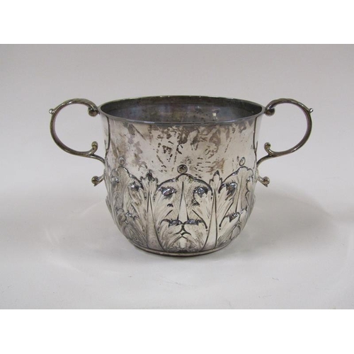 1765 - A late Victorian two handled loving cup, half leaf embossed, London 1890, 8.7ozt, 18cm w.