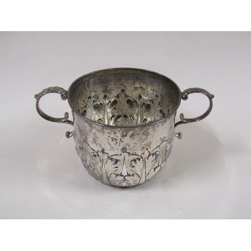 1765 - A late Victorian two handled loving cup, half leaf embossed, London 1890, 8.7ozt, 18cm w.