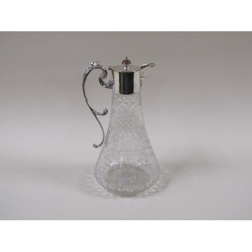 1805 - An Edwardian cut and engraved glass claret jug with silver plated mount and scrolling handle, 27cm h... 