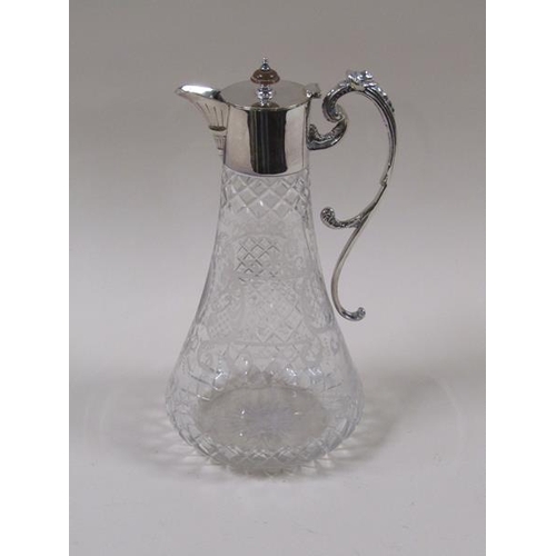 1805 - An Edwardian cut and engraved glass claret jug with silver plated mount and scrolling handle, 27cm h... 