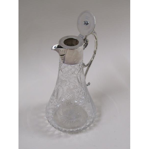 1805 - An Edwardian cut and engraved glass claret jug with silver plated mount and scrolling handle, 27cm h... 