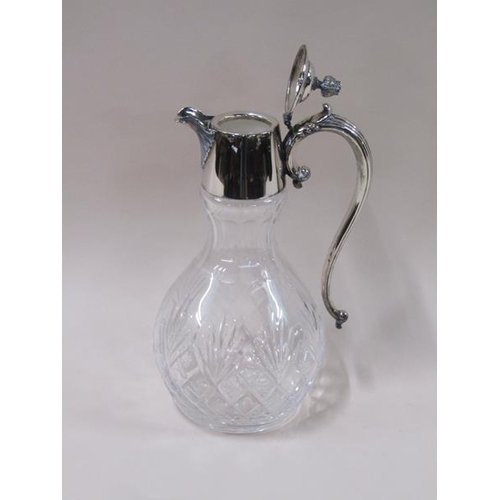 1808 - An Edwardian cut glass baluster claret jug with silver plated mount and having scrolling handle, 31c... 