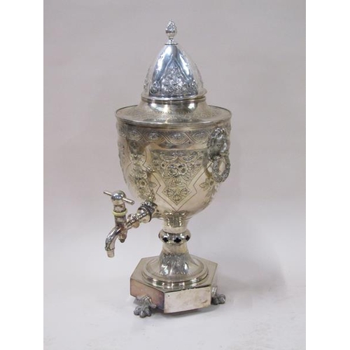 1809 - A 19c silver plate banqueting tea urn of large size, the urn embossed and chased throughout with lea... 