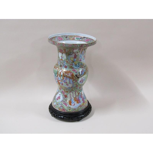 1951 - A 19c Chinese famille rose vase of baluster form with a wide flared rim, typical figurative decorati... 