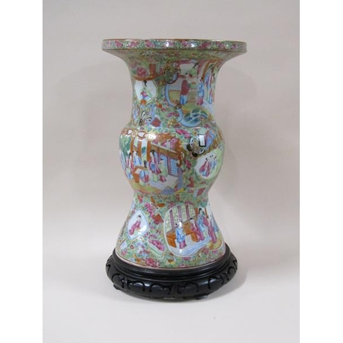 1951 - A 19c Chinese famille rose vase of baluster form with a wide flared rim, typical figurative decorati... 