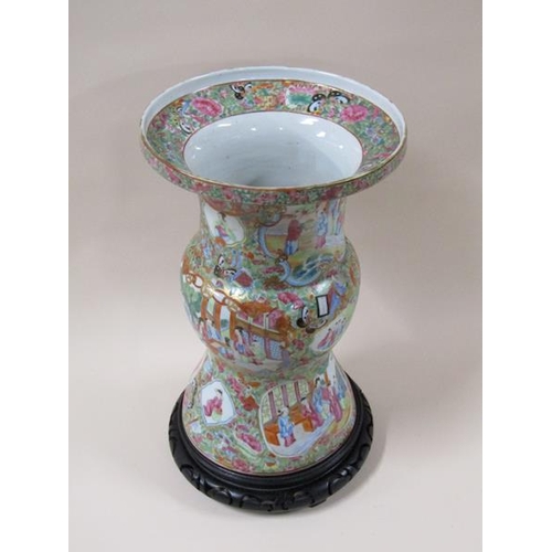 1951 - A 19c Chinese famille rose vase of baluster form with a wide flared rim, typical figurative decorati... 