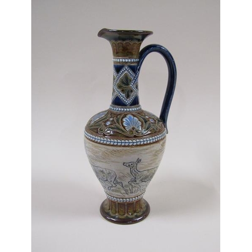 1955 - A Victorian Doulton Lambeth Hannah Barlow ewer, decorated with deer and stag frieze within foliate b... 