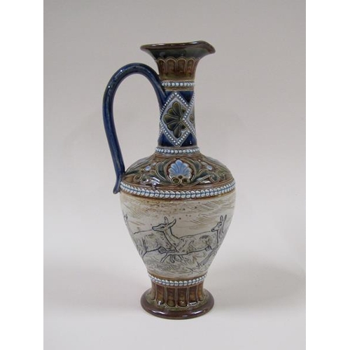 1955 - A Victorian Doulton Lambeth Hannah Barlow ewer, decorated with deer and stag frieze within foliate b... 