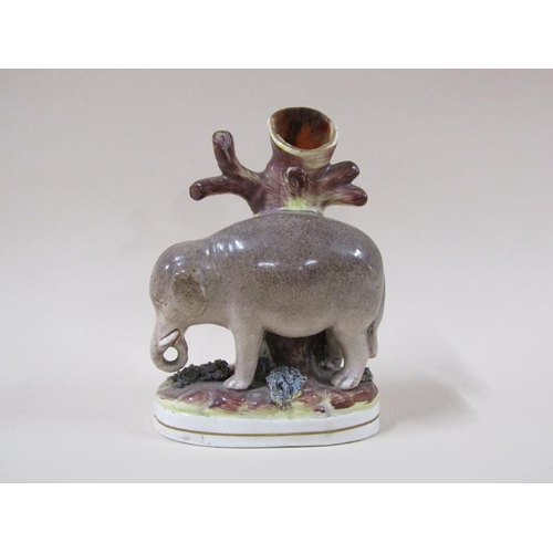 1960 - A 19c Victorian Staffordshire elephant spill vase, 17cm h.