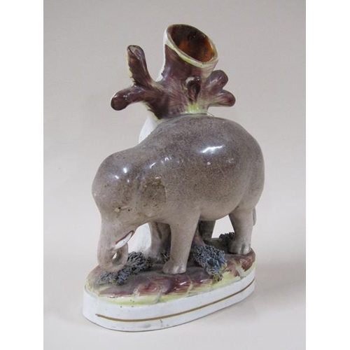 1960 - A 19c Victorian Staffordshire elephant spill vase, 17cm h.