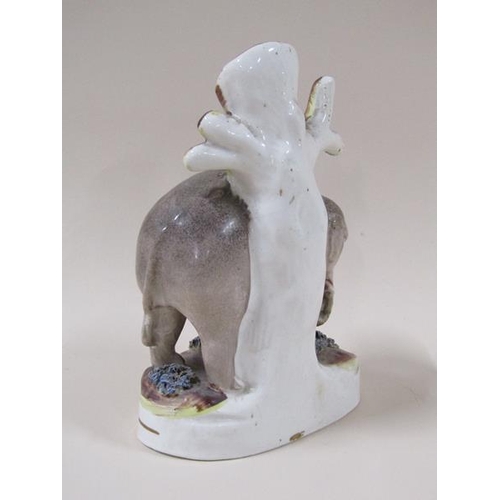 1960 - A 19c Victorian Staffordshire elephant spill vase, 17cm h.