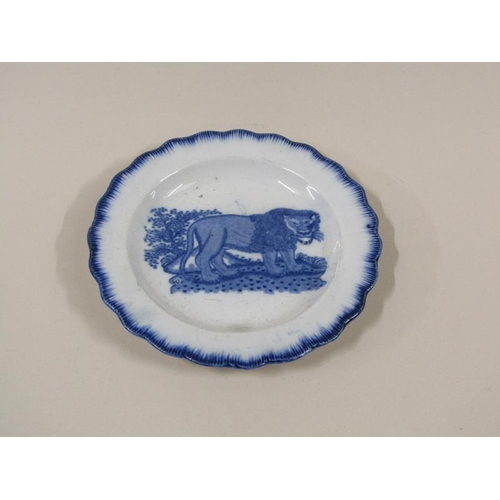 1965 - A late 18c/early 19c pearlware child's plate, transfer printed with a lion with scalloped rim, 13cm ... 