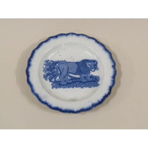 1965 - A late 18c/early 19c pearlware child's plate, transfer printed with a lion with scalloped rim, 13cm ... 