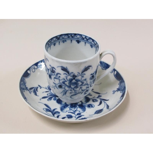 1966 - A Worcester First Period cup and saucer, blue and white decorated with floral sprays, blue crescent ... 