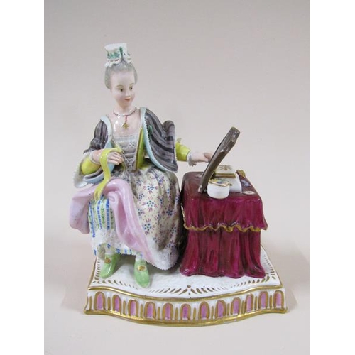 1967 - A pair of Meissen porcelain figure groups - girl seated feeding bird in cage & lady seated with dres... 