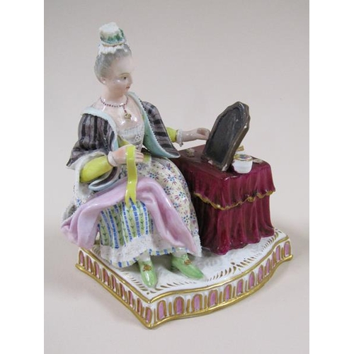 1967 - A pair of Meissen porcelain figure groups - girl seated feeding bird in cage & lady seated with dres... 