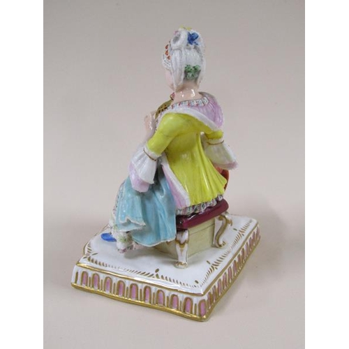 1967 - A pair of Meissen porcelain figure groups - girl seated feeding bird in cage & lady seated with dres... 