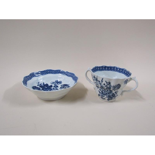 1969 - An 18c Worcester blue and white two handled tea cup and saucer decorated in 'Three Flowers' pattern ... 