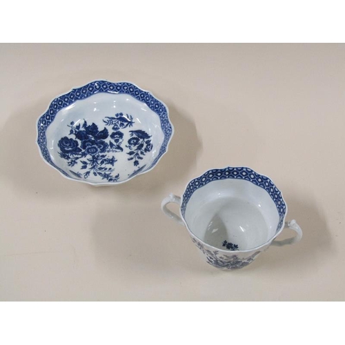 1969 - An 18c Worcester blue and white two handled tea cup and saucer decorated in 'Three Flowers' pattern ... 