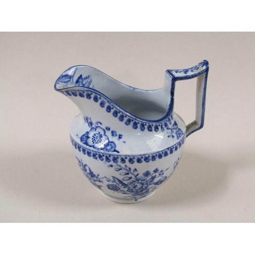 1970 - An early 19c pearlware cream jug, transfer printed blue and white with floral decoration, 9cm h.