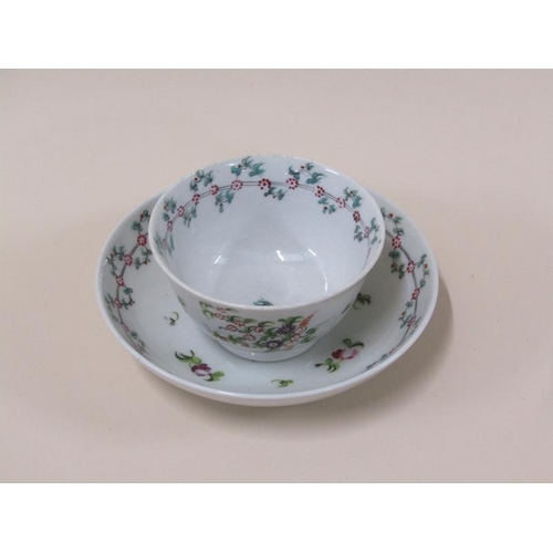 1971 - A late 18c New Hall porcelain tea bowl and saucer with floral garland borders and floral sprays, sau... 