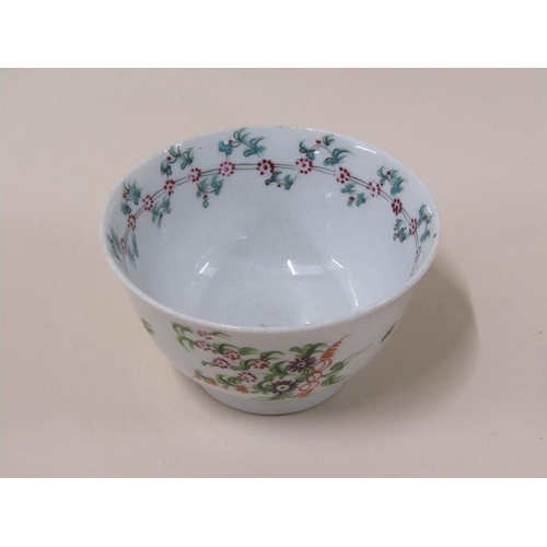 1971 - A late 18c New Hall porcelain tea bowl and saucer with floral garland borders and floral sprays, sau... 