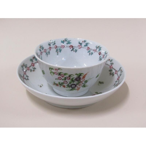 1971 - A late 18c New Hall porcelain tea bowl and saucer with floral garland borders and floral sprays, sau... 