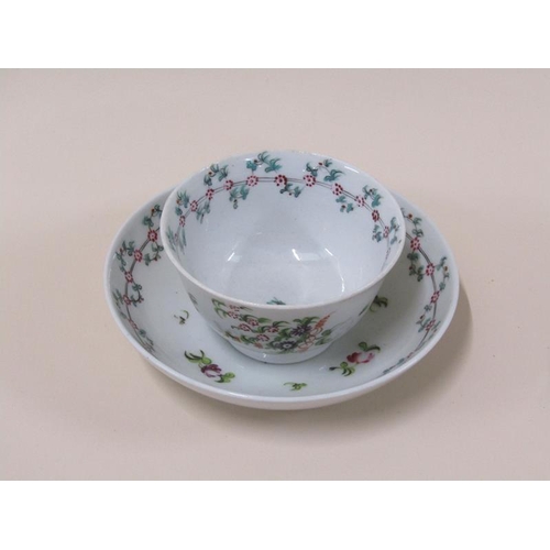 1971 - A late 18c New Hall porcelain tea bowl and saucer with floral garland borders and floral sprays, sau... 