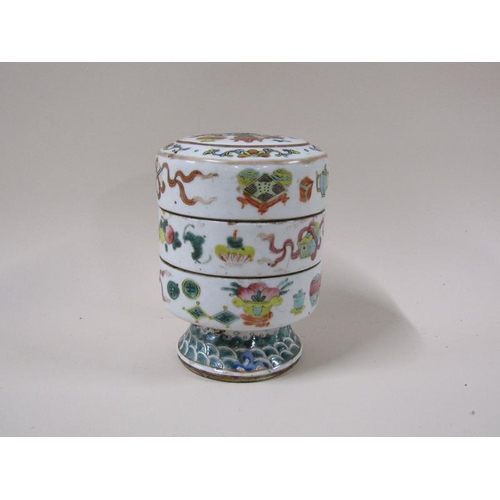 1980 - An Oriental two compartment famille verte stacking jar, character mark to base, 15cm h.