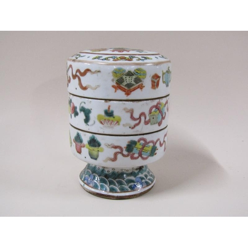 1980 - An Oriental two compartment famille verte stacking jar, character mark to base, 15cm h.