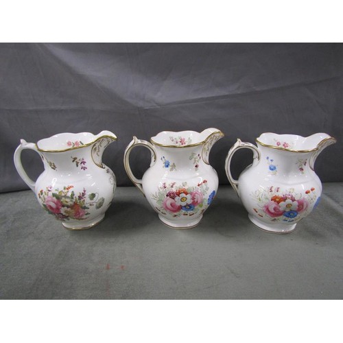 1972 - Three Coalport Royal Commemorative jugs with floral decoration and gilding, with syphers for Queen V... 