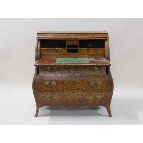 2017 - A late 18c/early 19c Dutch bombe cylinder top bureau, rising to reveal a fitted interior with pull o... 