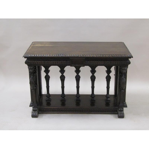 2067 - A 19c oak centre table of rectangular form, the table edge and frieze lunette carved and supported o... 