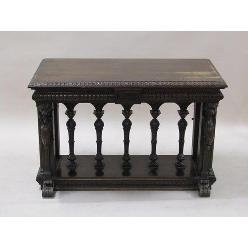 2067 - A 19c oak centre table of rectangular form, the table edge and frieze lunette carved and supported o... 