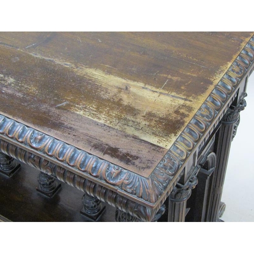 2067 - A 19c oak centre table of rectangular form, the table edge and frieze lunette carved and supported o... 