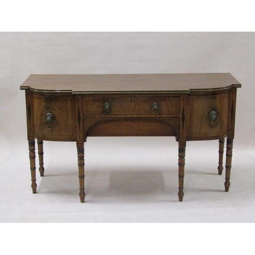 2071 - An early 19c mahogany sideboard with a central frieze drawer over a lower pull out drawer with arche... 