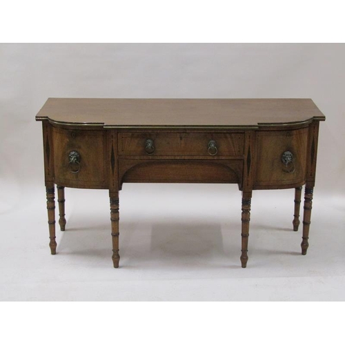 2071 - An early 19c mahogany sideboard with a central frieze drawer over a lower pull out drawer with arche... 