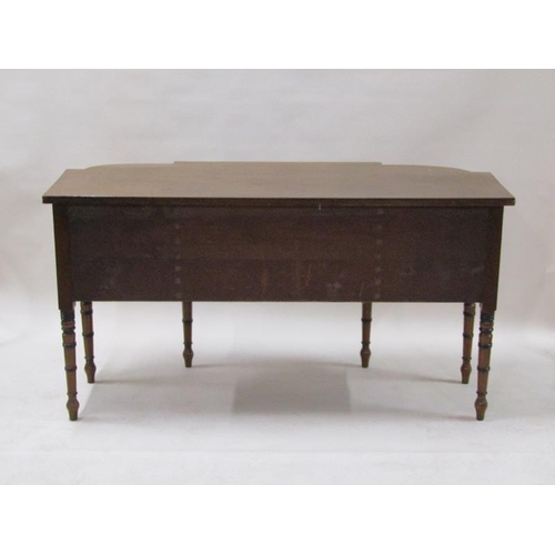 2071 - An early 19c mahogany sideboard with a central frieze drawer over a lower pull out drawer with arche... 